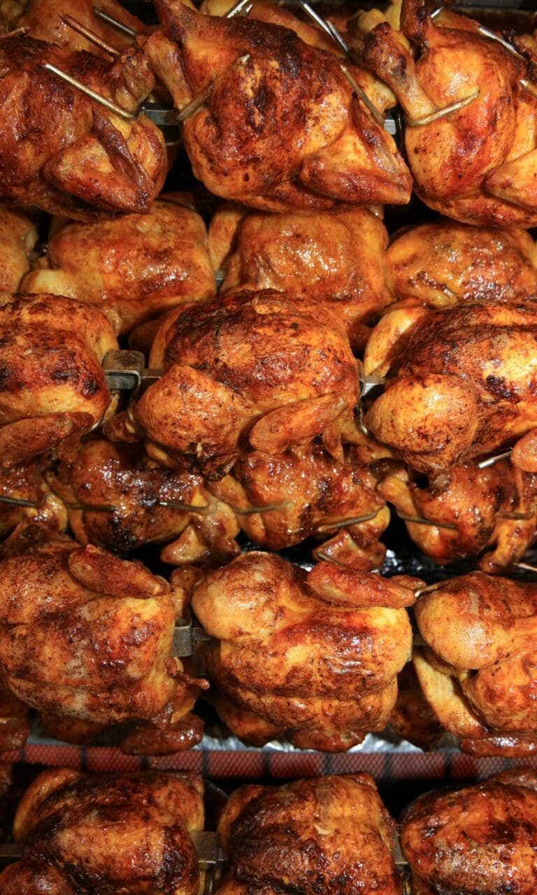 chickens on a rotisserie spit
